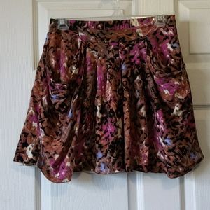 Pleated mini skirt with pockets